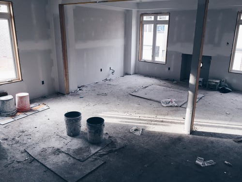 What does post-construction cleaning include?